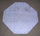 White octagonal wooden pad base