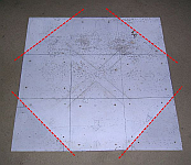 White square wooden pad base layer showing cut lines