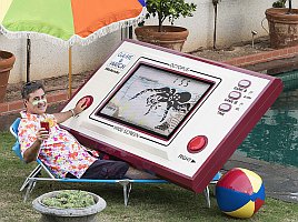 Playing the World's largest Game & Watch by the pool