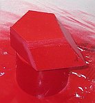 Spray painting the prism red