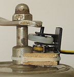 Scroll wheel mounted on the grinder shaft