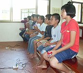 Kids at the Agape Home for babies with HIV/AIDS playing Multiplayer Guitar Hero
